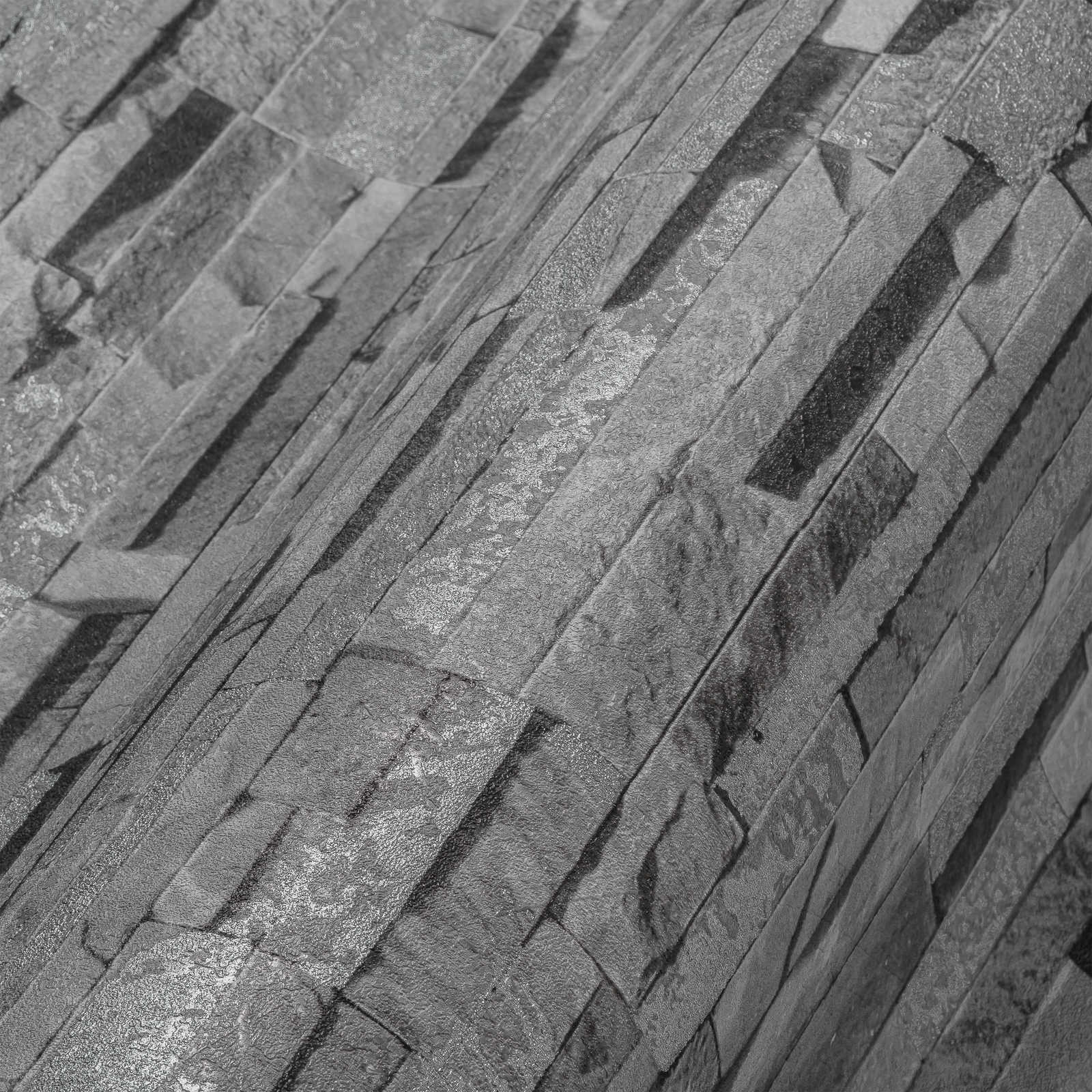             Vliestapete mit Steinoptik & Glanzeffekt – Grau
        