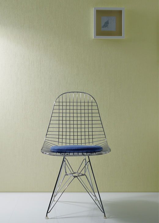 Painters-non-woven-pale-yellow-painted-room-with-chair-and-wall-picture