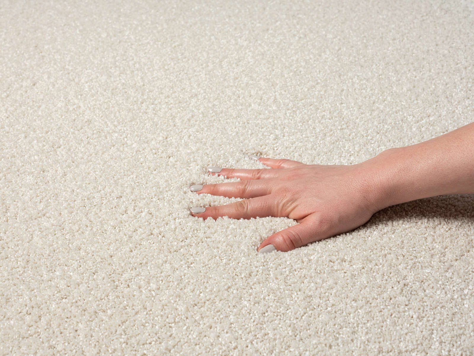             Cremefarbener Kurzflor Teppich – 170 x 120 cm
        