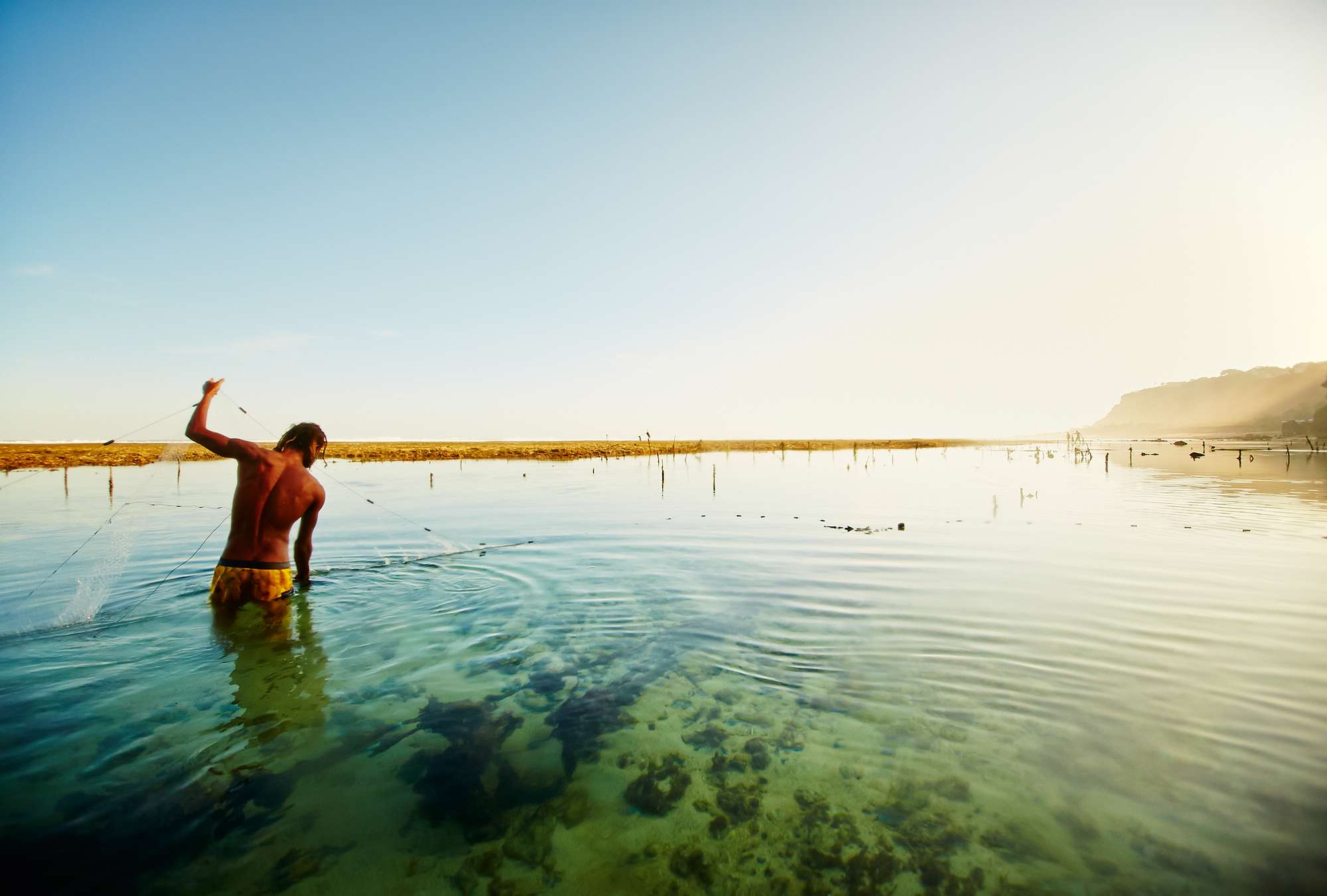             Fototapete Meereslandschaft – Fischer auf Bali
        