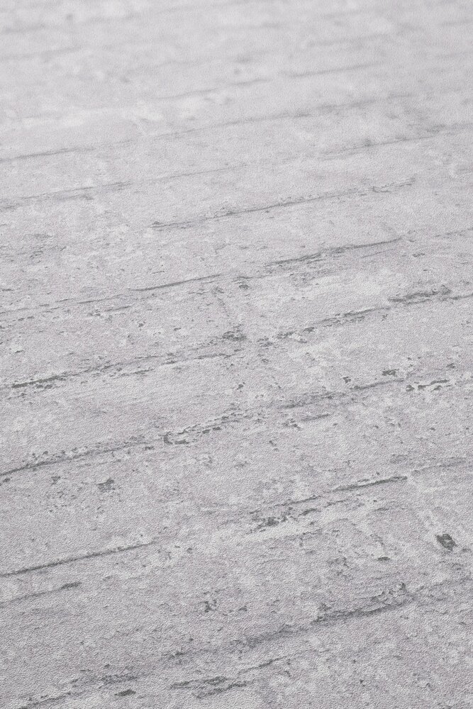             Helle Vliestapete in dezenter Backsteinoptik – hellgrau
        