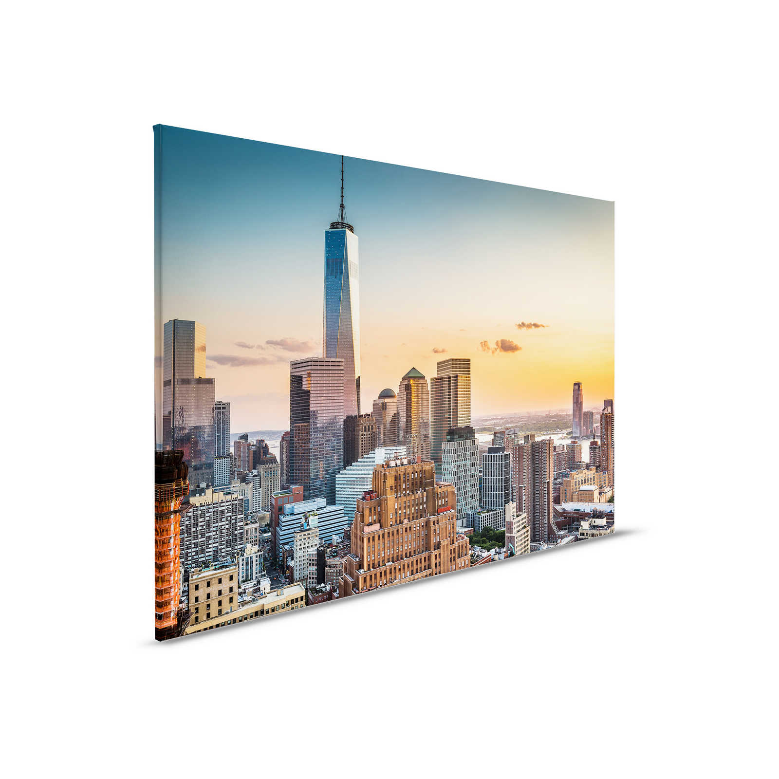         Canvas schilderij met Manhattan skyline bij zonsondergang - 0.90 m x 0.60 m
    