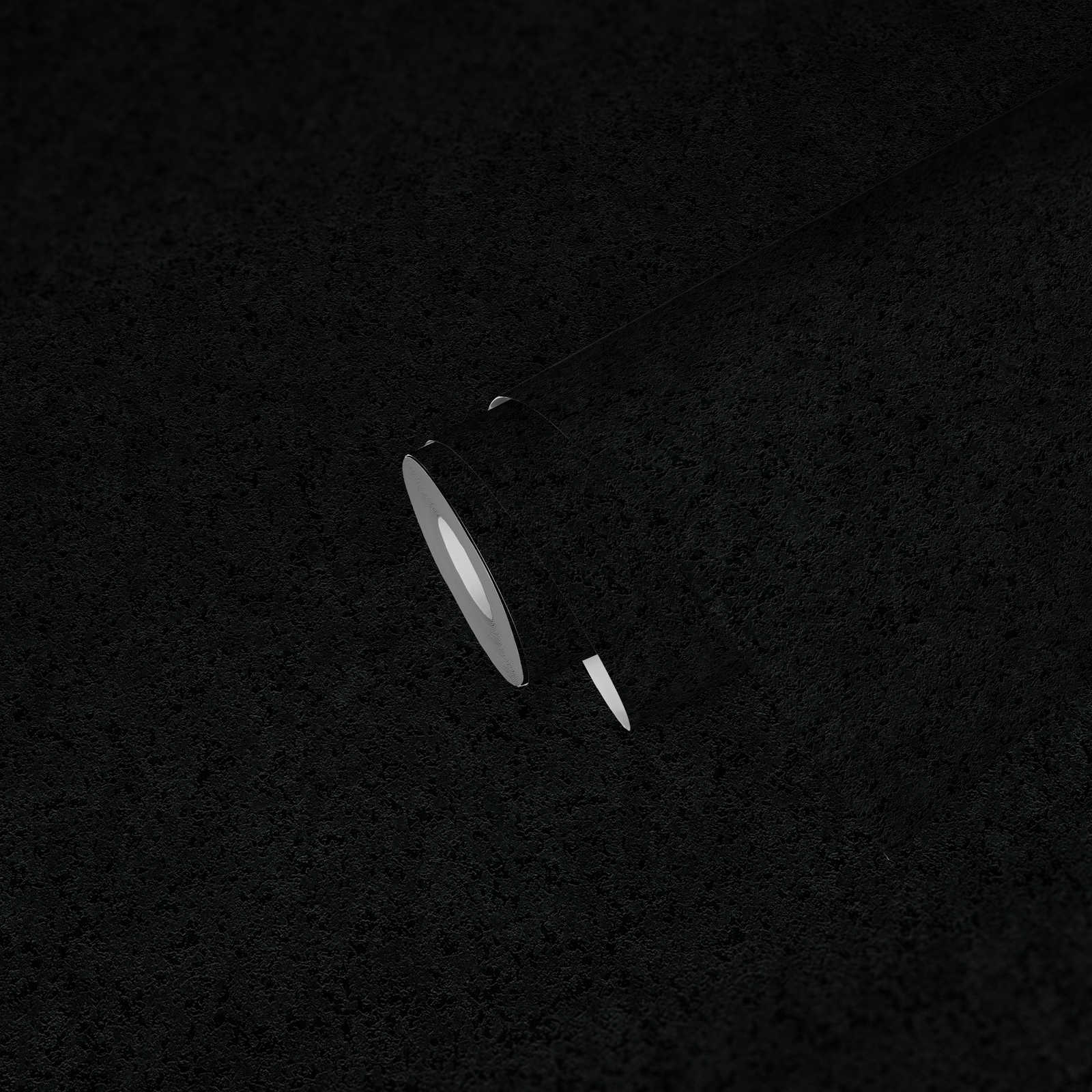             Schwarze Vliestapete einfarbig mit Texturmuster
        