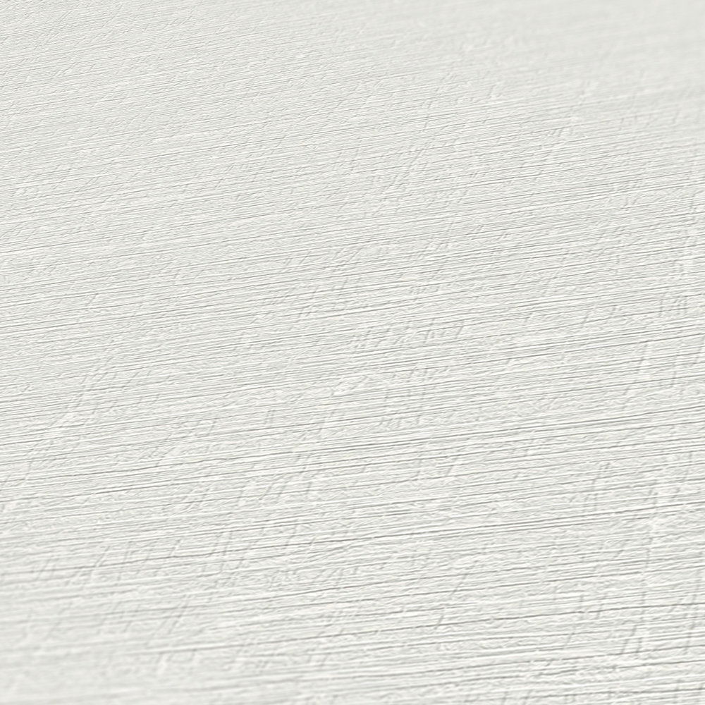             Schlichte Unitapete mit leichter Struktur – Grau
        