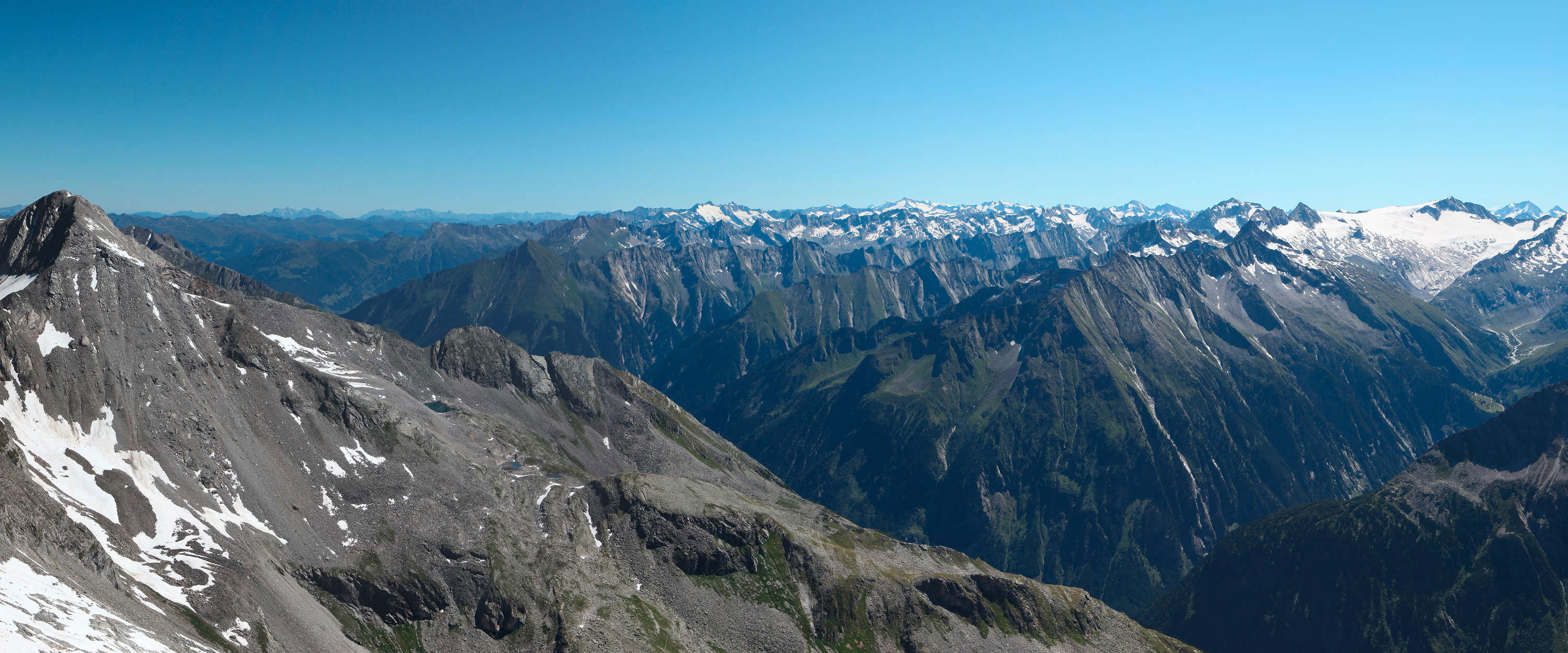             Panorama Fototapete mit zerklüftetem Alpengebirge
        
