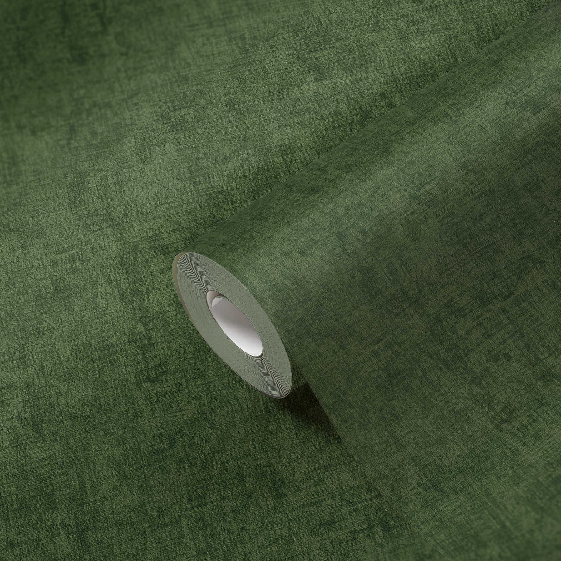             Papier peint uni vert jungle chiné avec gaufrage structuré
        