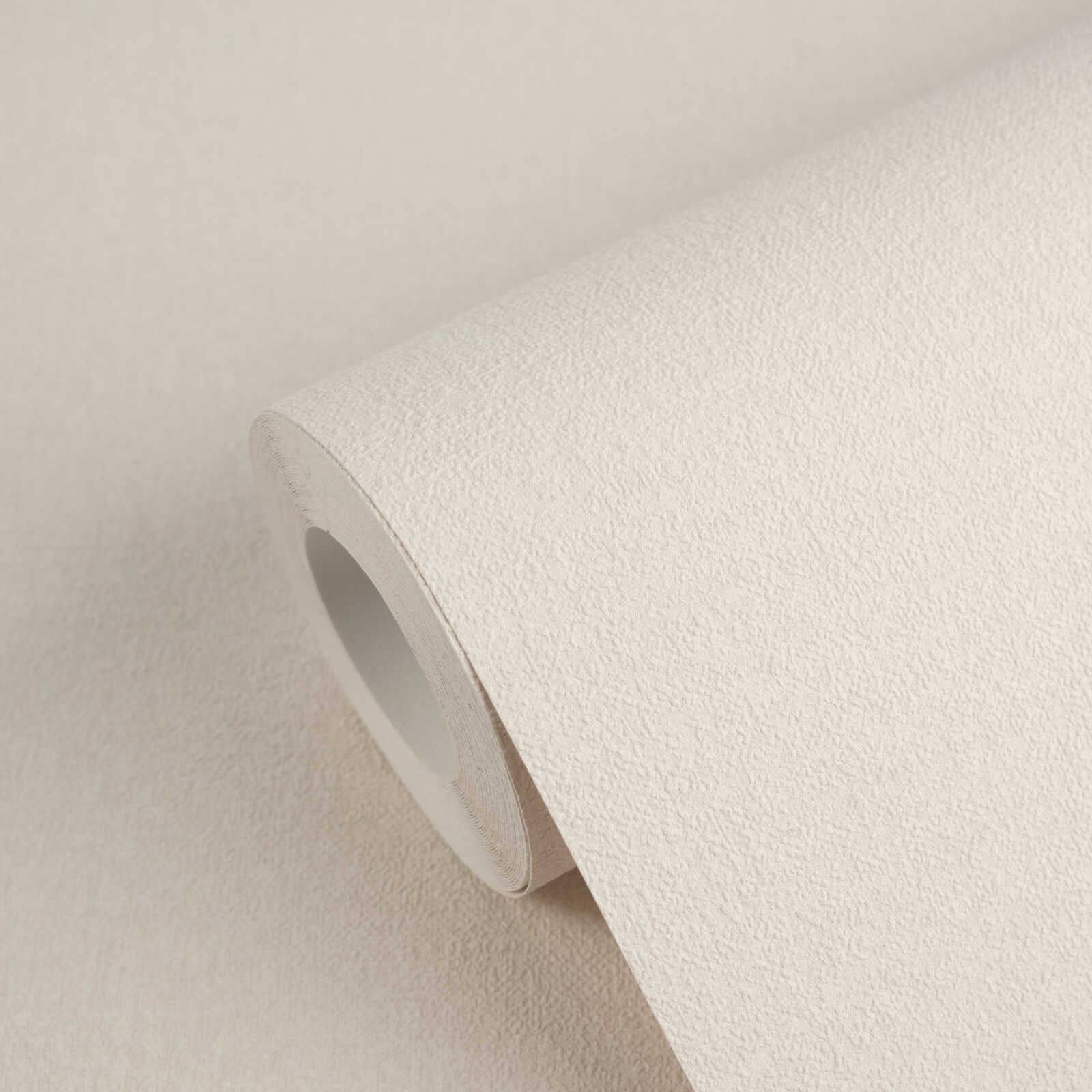 Dezente Unitapete mit feiner Struktur – Creme