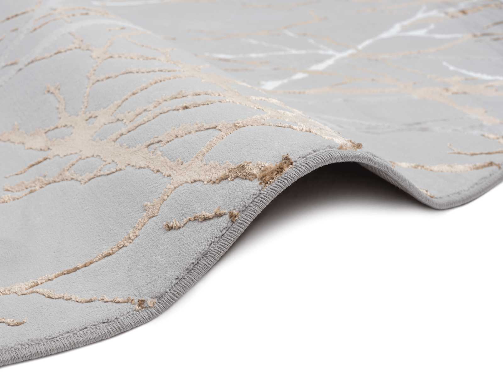             Bemusterter Hochflor Teppich in Grau – 150 x 80 cm
        