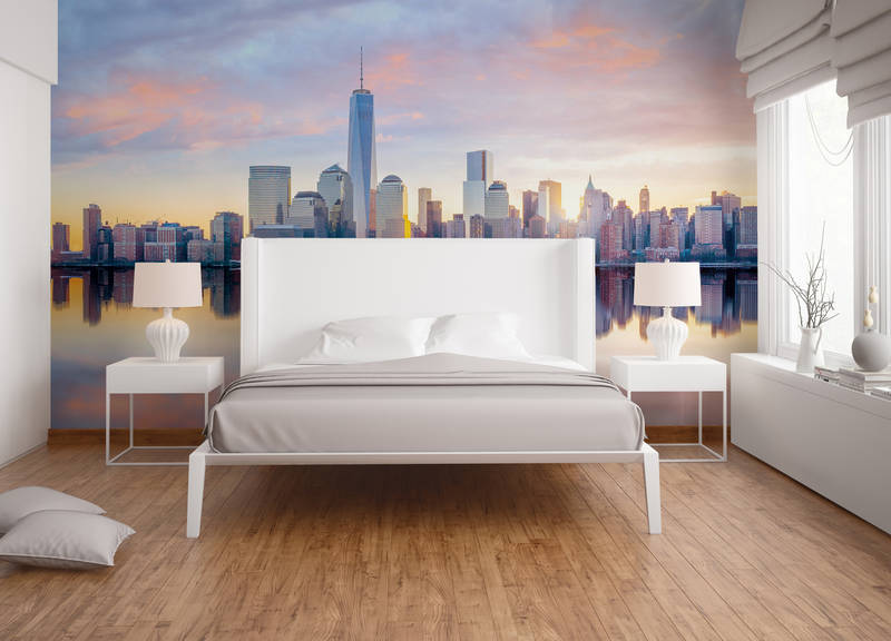             Photo wallpaper New York skyline in the morning - blue, grey, yellow
        