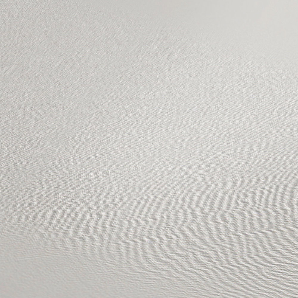             Vliestapete Creme-Weiß mit natürlicher Textiloptik
        