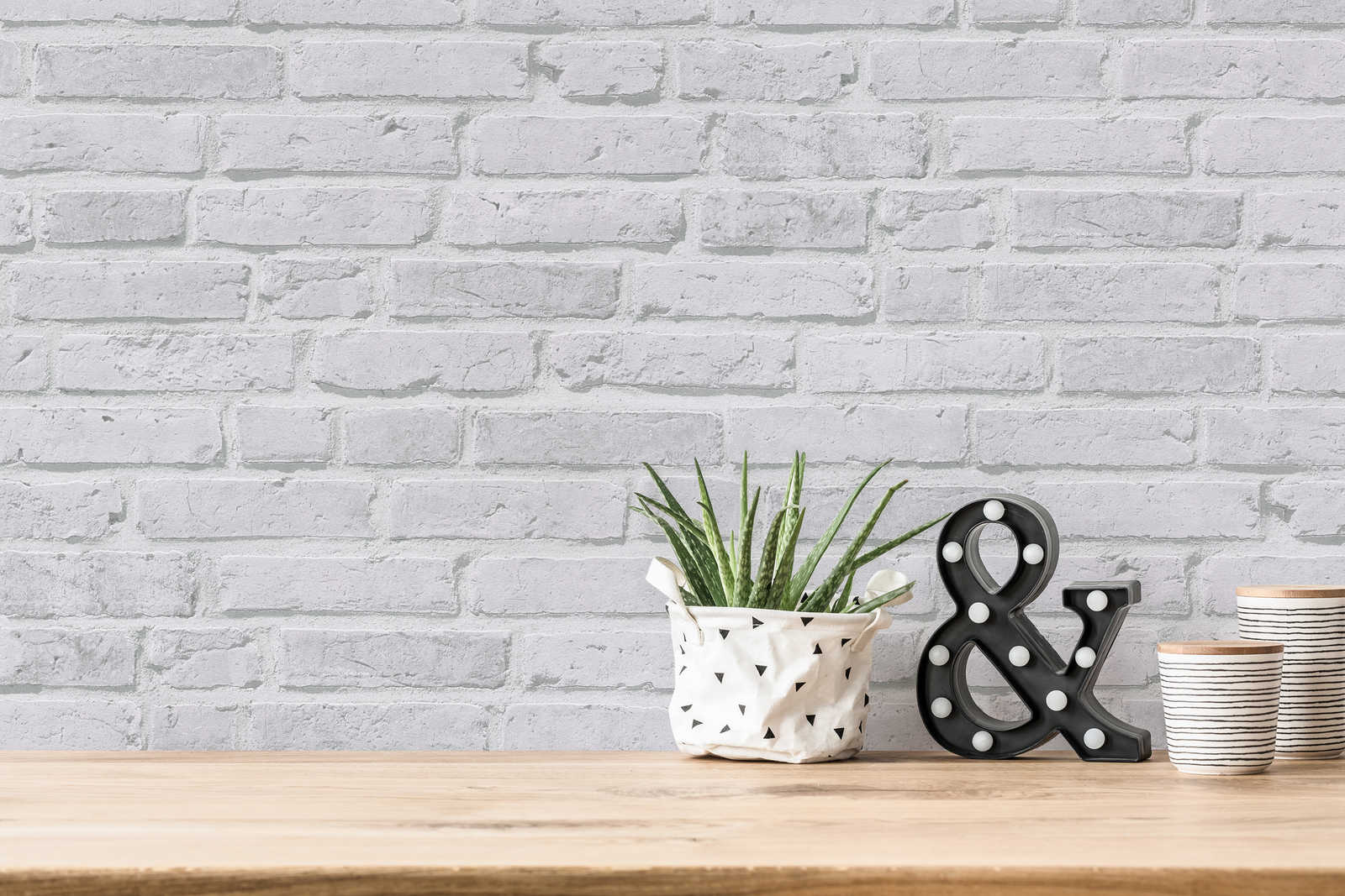            Helle Backstein-Tapete mit 3D-Optik – Grau
        