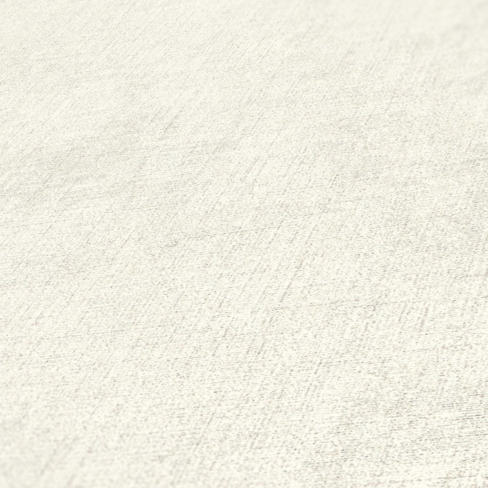            Vliestapete uni mit Textil-Optik – Creme
        