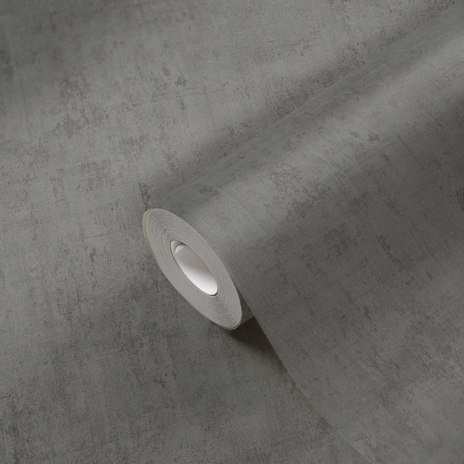             Tapete Dunkelgrau mit Putzoptik & Prägestruktur
        