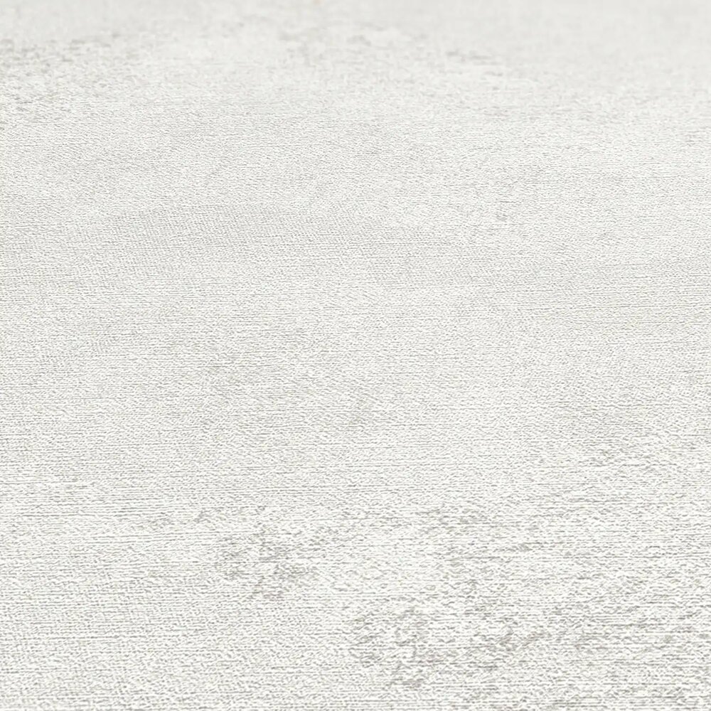             Exklusive Vliestapete mit strukturierter und schimmernder Wellenoptik – Weiß, Grau, Metallic
        