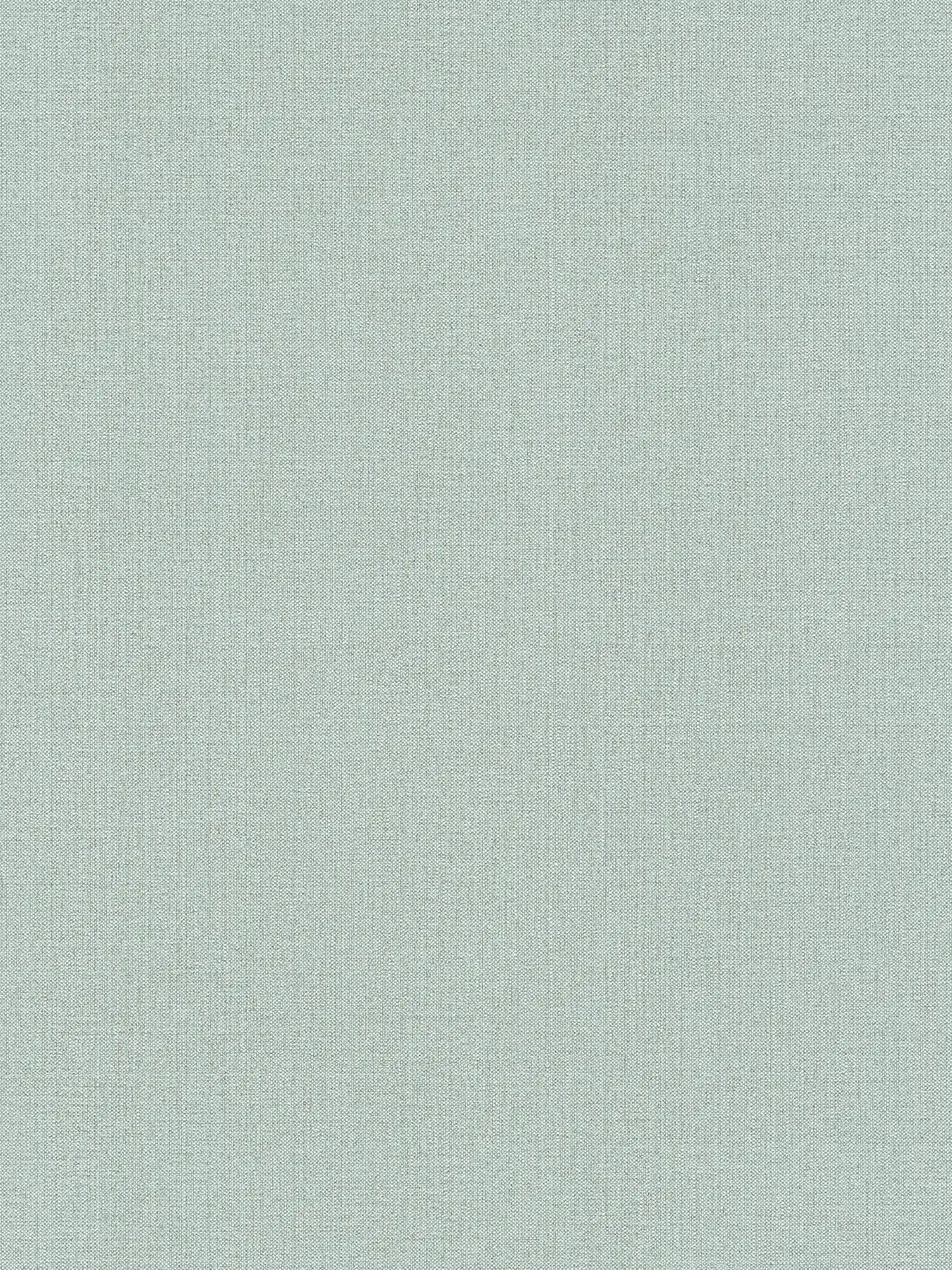         Groen vliesbehang watergroen gevlekt met textielstructuur
    