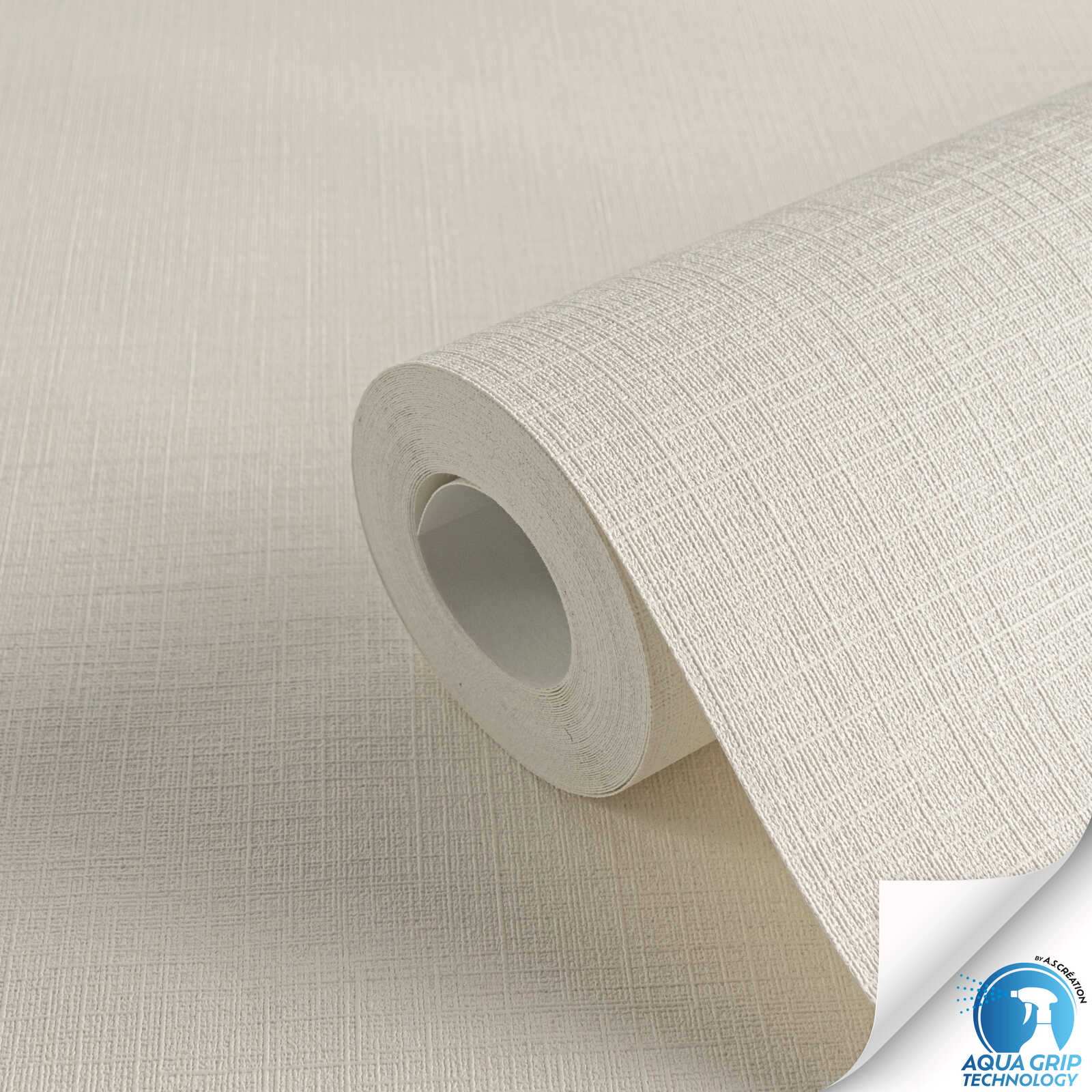         Plain non-woven wallpaper with a mottled textile texture - Water. Fix. Ready. - Beige
    