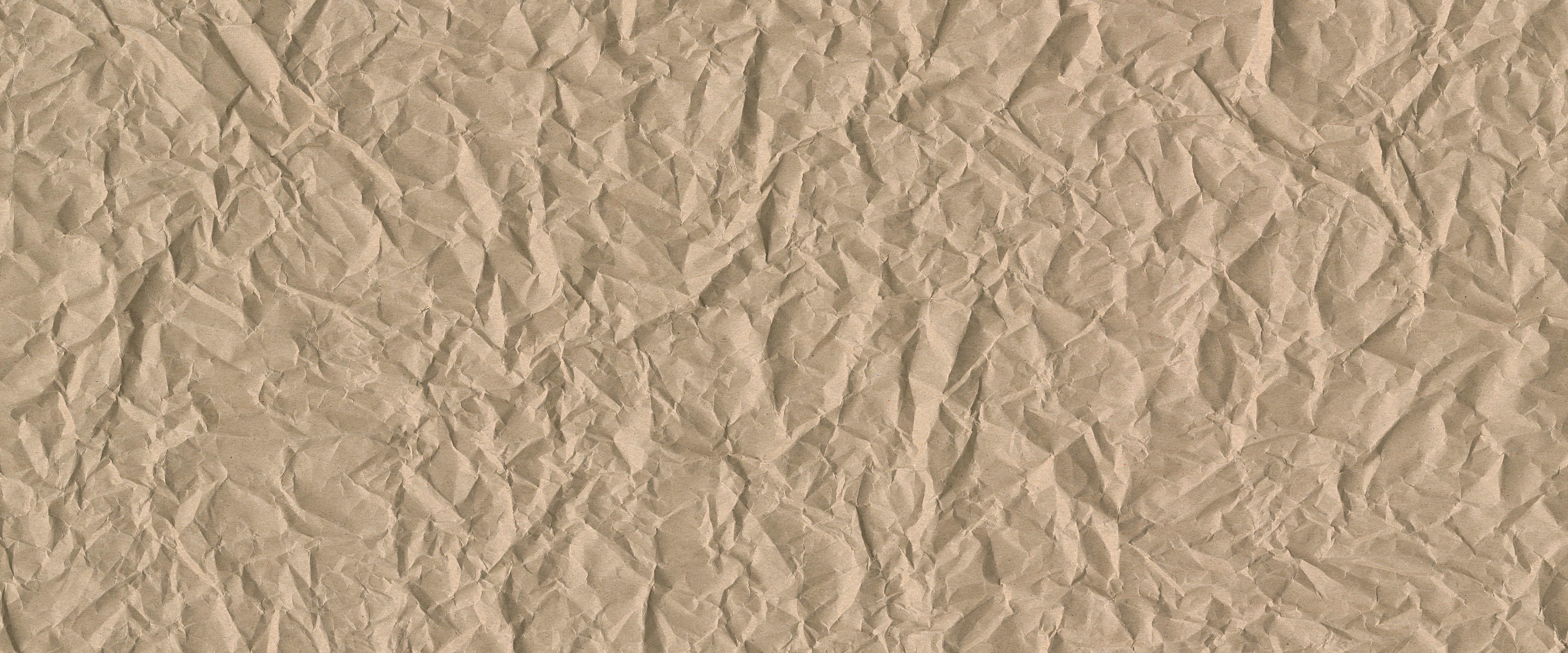             Fototapete mit spannungsreicher Oberflächenoptik – Crushed Paper
        