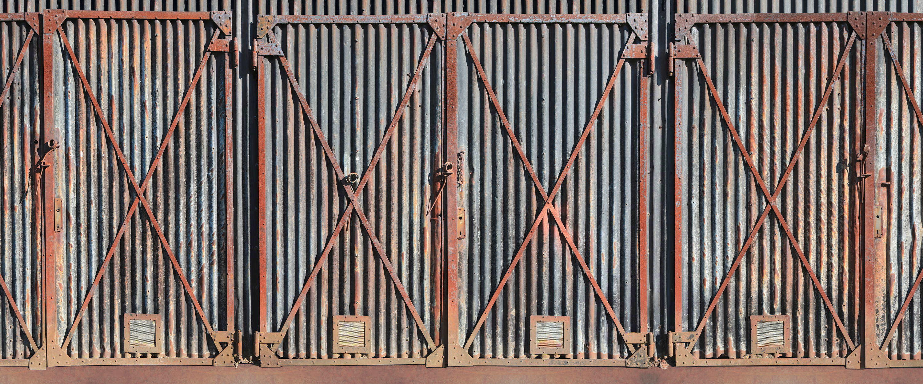             Fototapete Stahltor rostig im Industrial Style
        