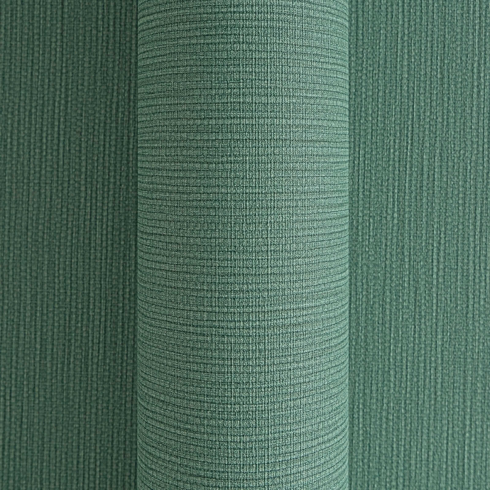             Einfarbige MICHALSKY Vliestapete mit Texturwirkung in dunklem Farbton – Grün
        