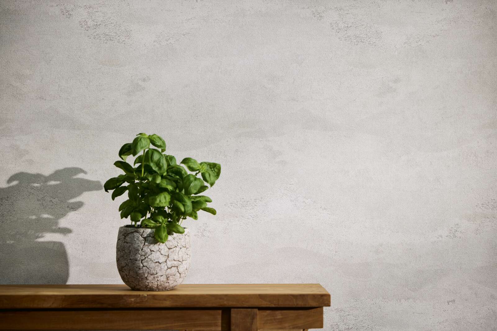             Exklusive Vliestapete mit strukturierter und schimmernder Wellenoptik – Weiß, Grau, Metallic
        