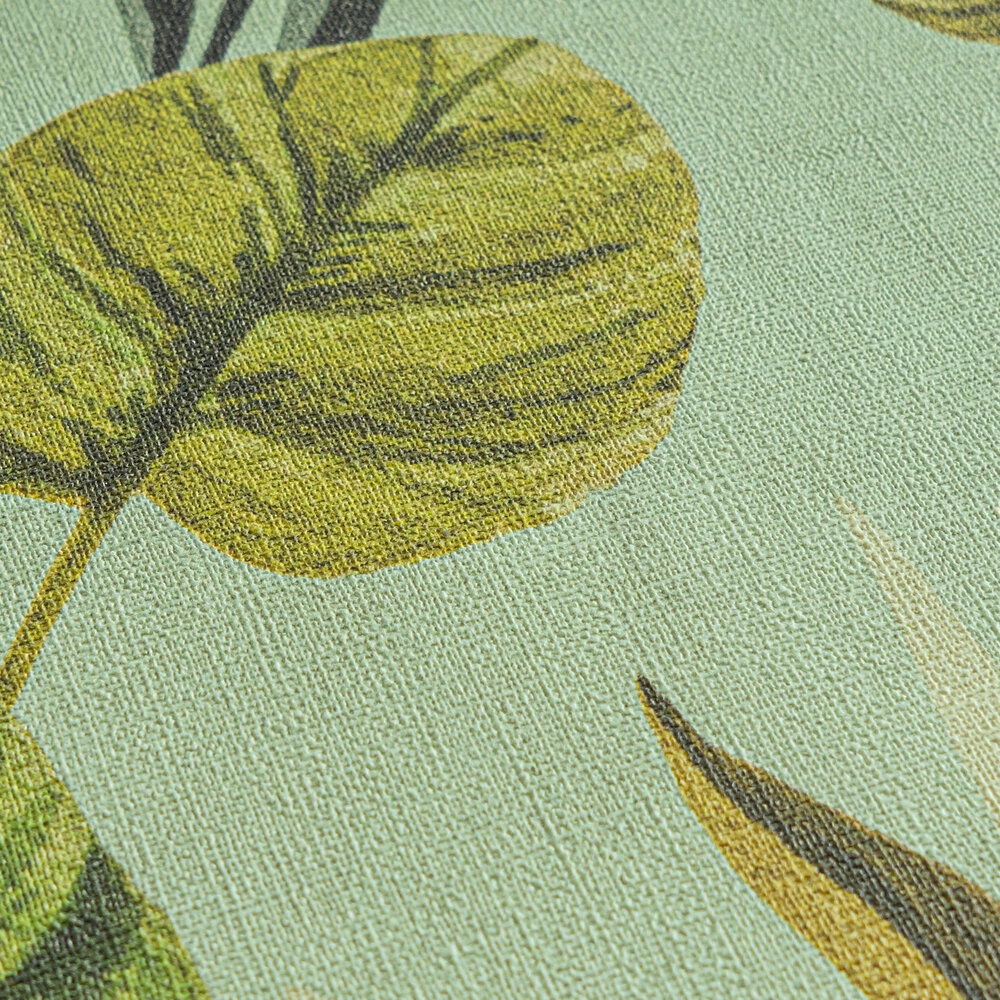             Wilde Vliestapete mit tropischem Blättermuster, einfach strukturiert – Grün, Blau
        