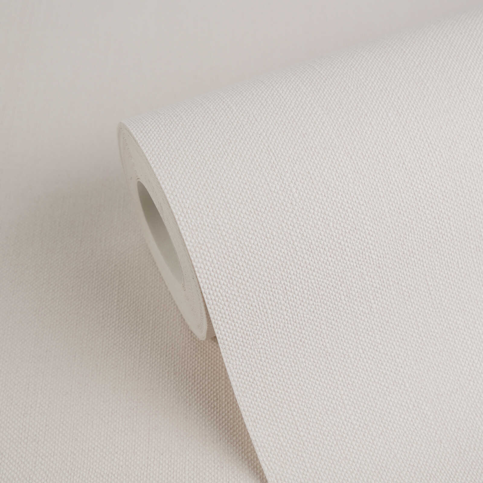 Einfarbige Vliestapete in Textiloptik – Rosa