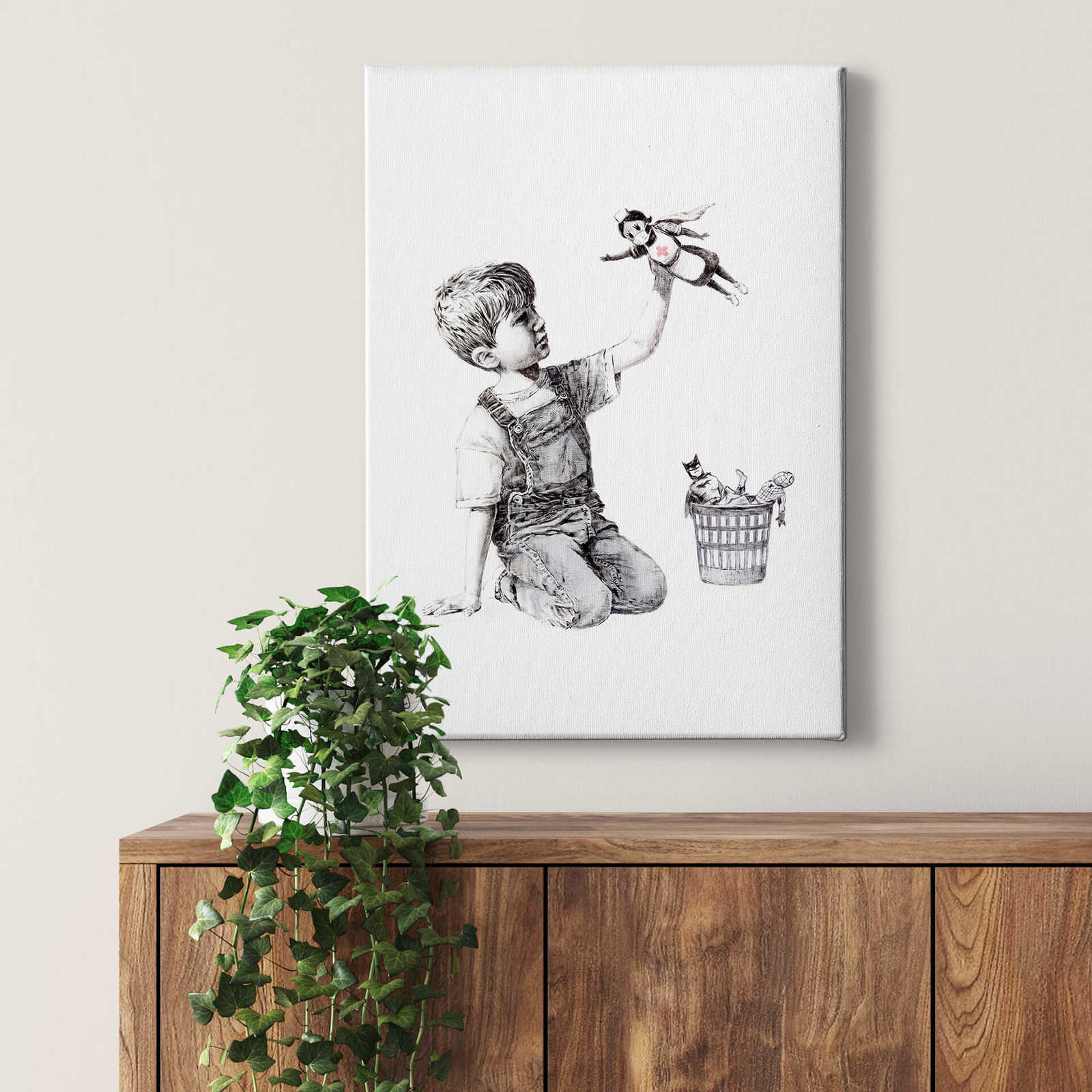 Leinwandbild Banksy 'Real Hero' – 0,50 m x 0,70 m