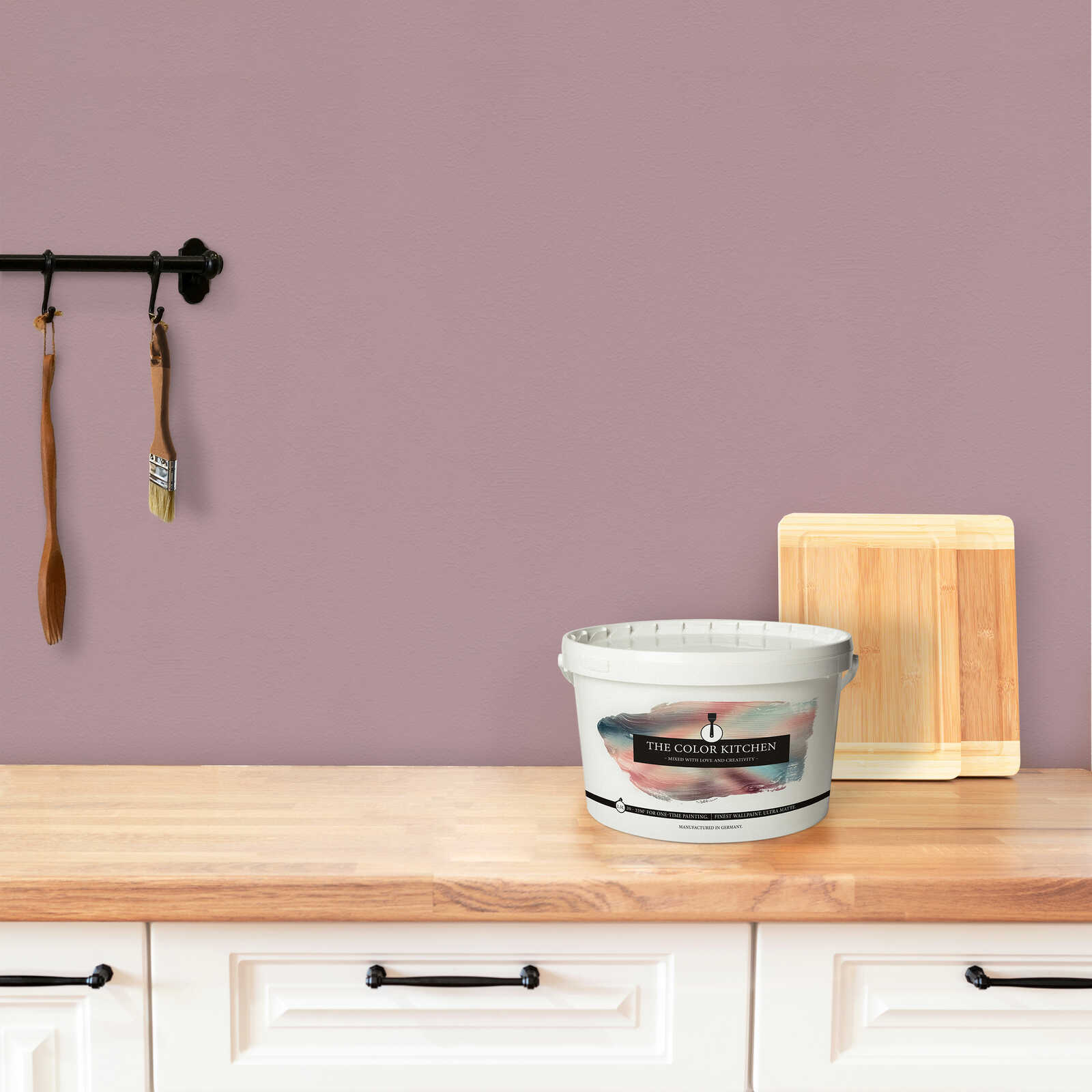 paint bucket, wall paint, kitchen, cutting board, wooden countertop