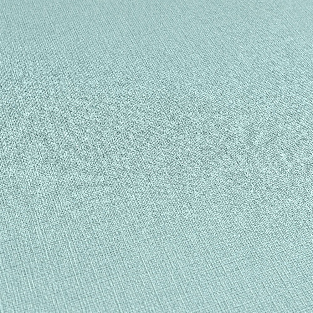             Einfarbige Vliestapete mit leichter Textiloptik von MICHALSKY – Blau
        