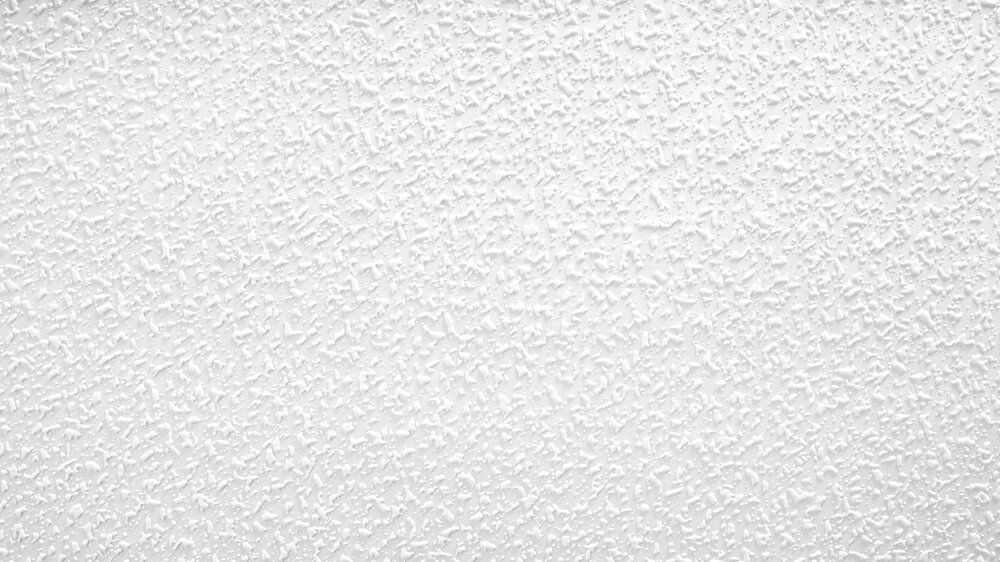             Strukturtapete mit feiner Raufaser-Optik – Weiß
        