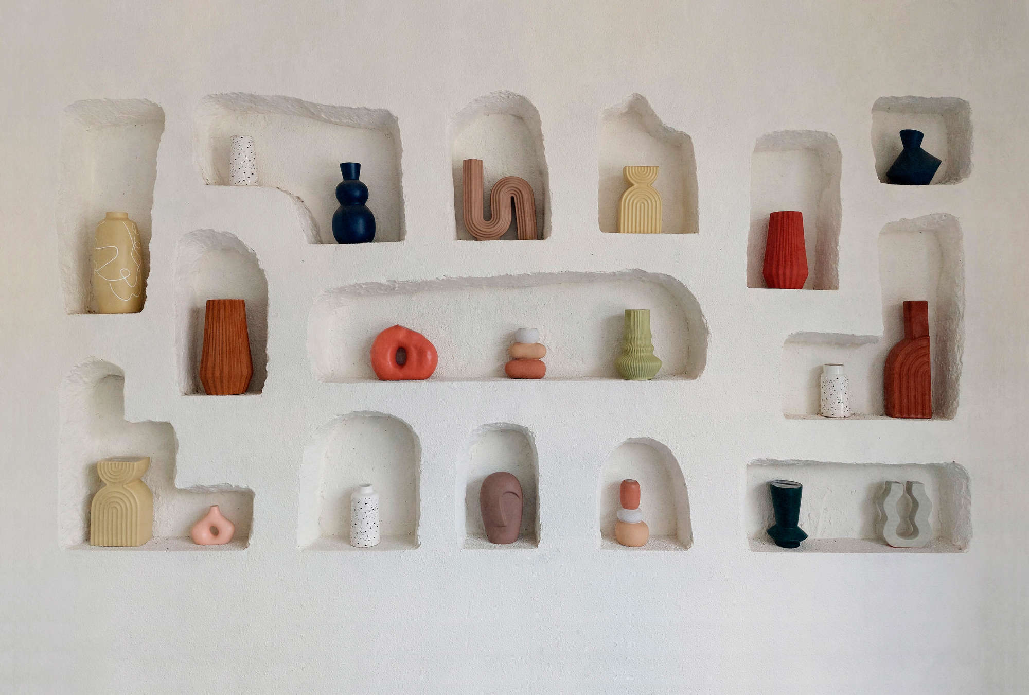 Fototapete »stucco« - Art-Déco Kunstgegenstände in Mauerwerk – Glattes, leicht glänzendes Premiumvlies
