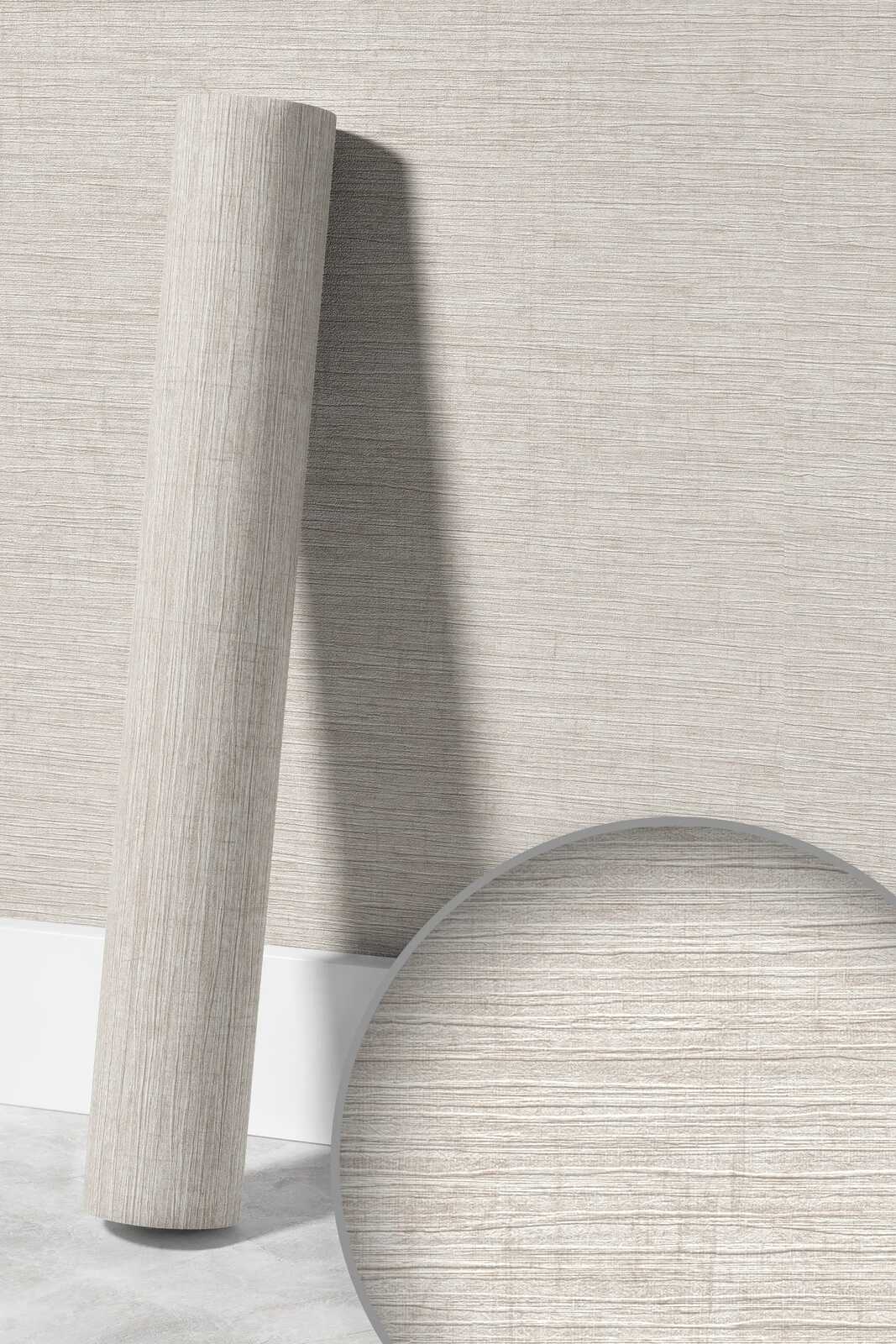             Vliestapete meliert mit textilem Prägemuster – Beige, Braun, Grau
        