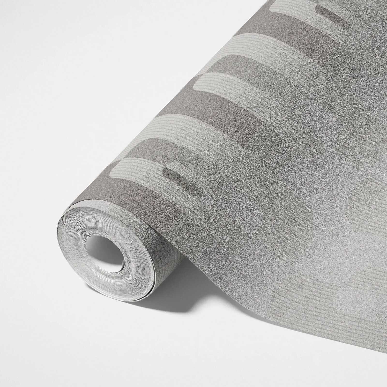             Grafik-Tapete mit Reto Muster in Grau und Silber
        