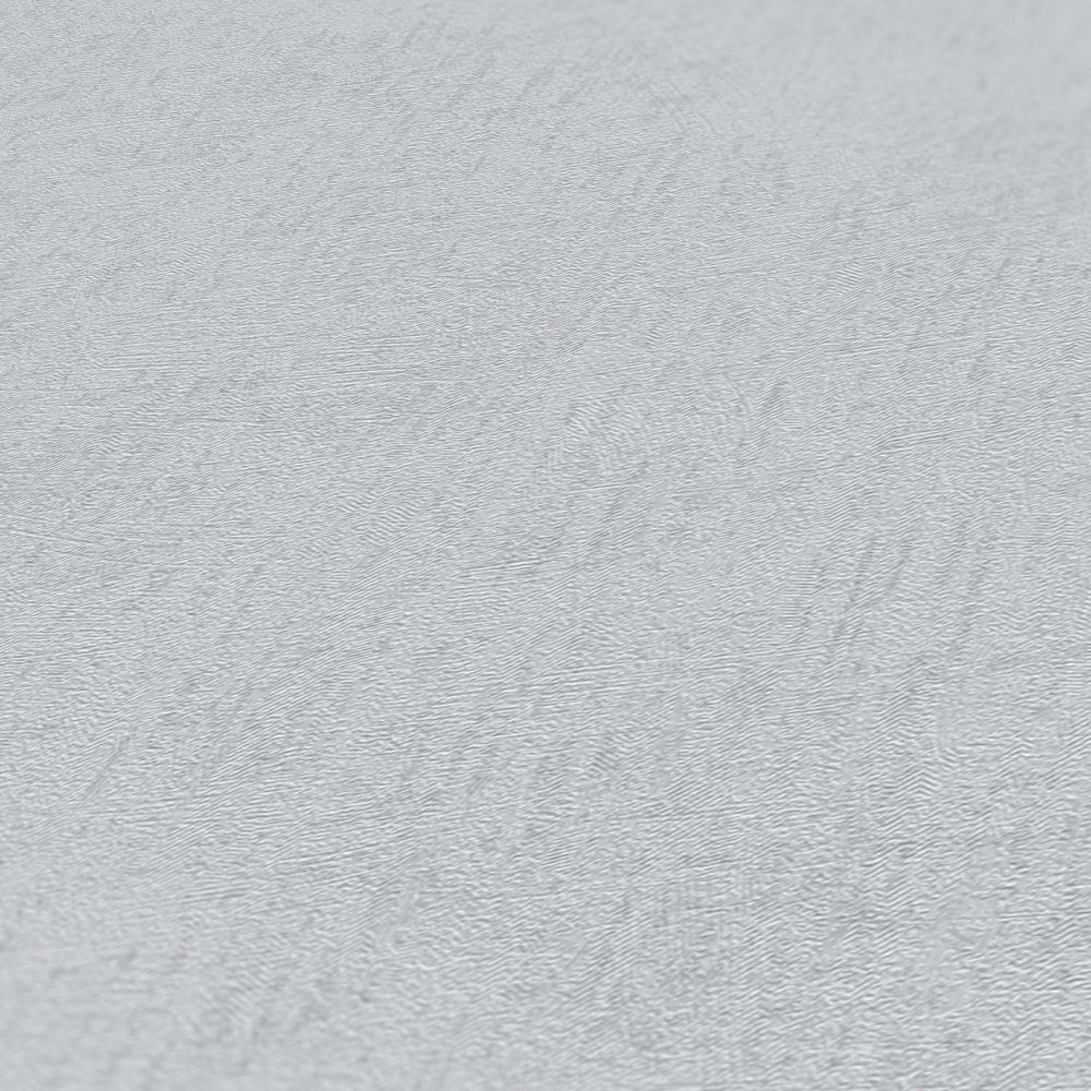             Melierte Tapete uni Grau mit Metallic Glanz
        