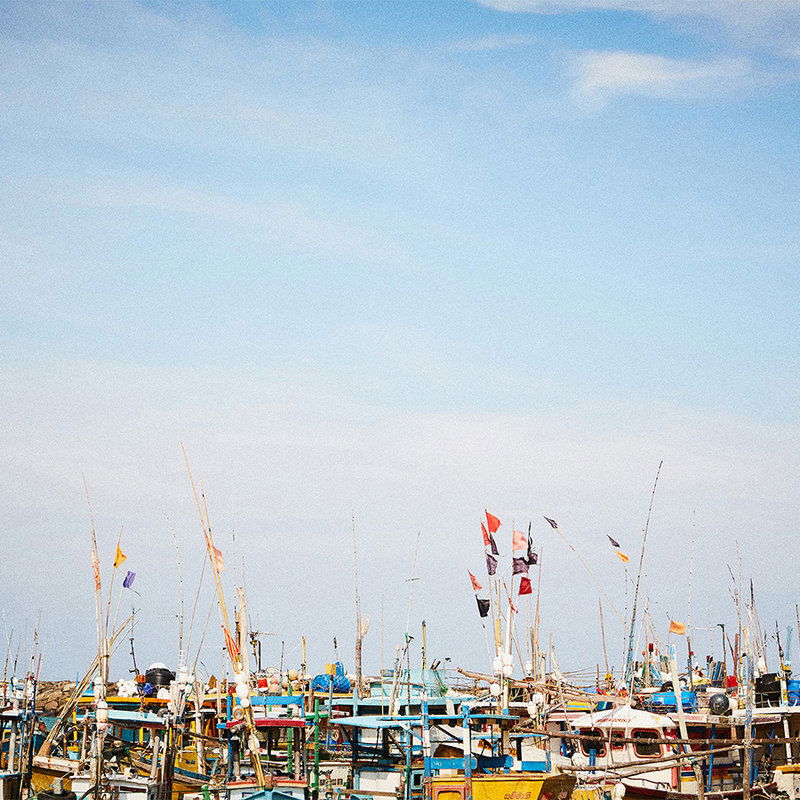         Sri Lanka photo wallpaper with harbour panorama - maritime non-woven wallpaper in coastal style - blue, white
    
