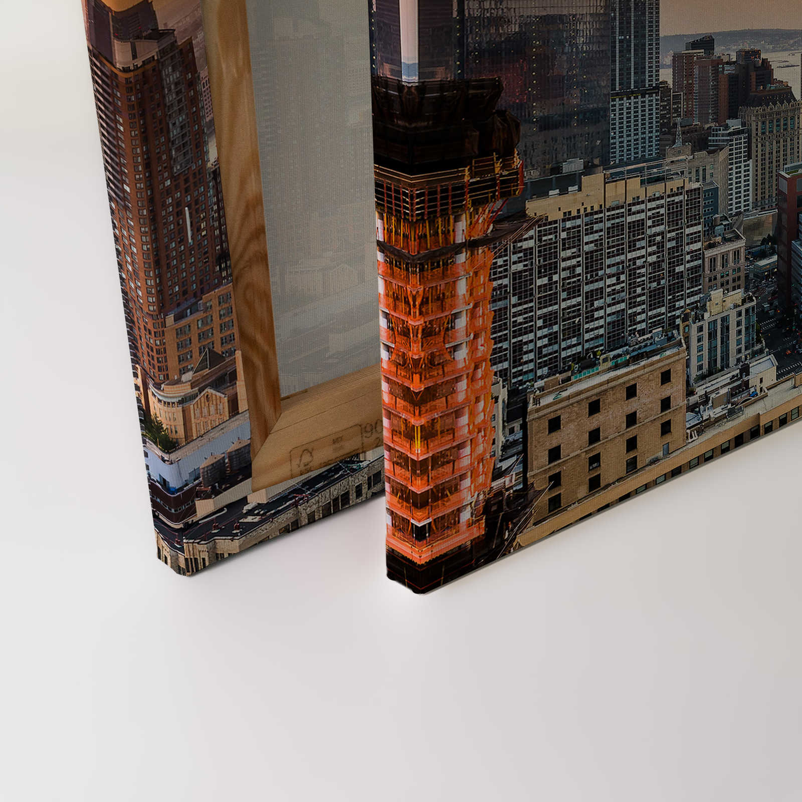             Leinwandbild mit der Skyline von Manhattan bei Sonnenuntergang – 0,90 m x 0,60 m
        