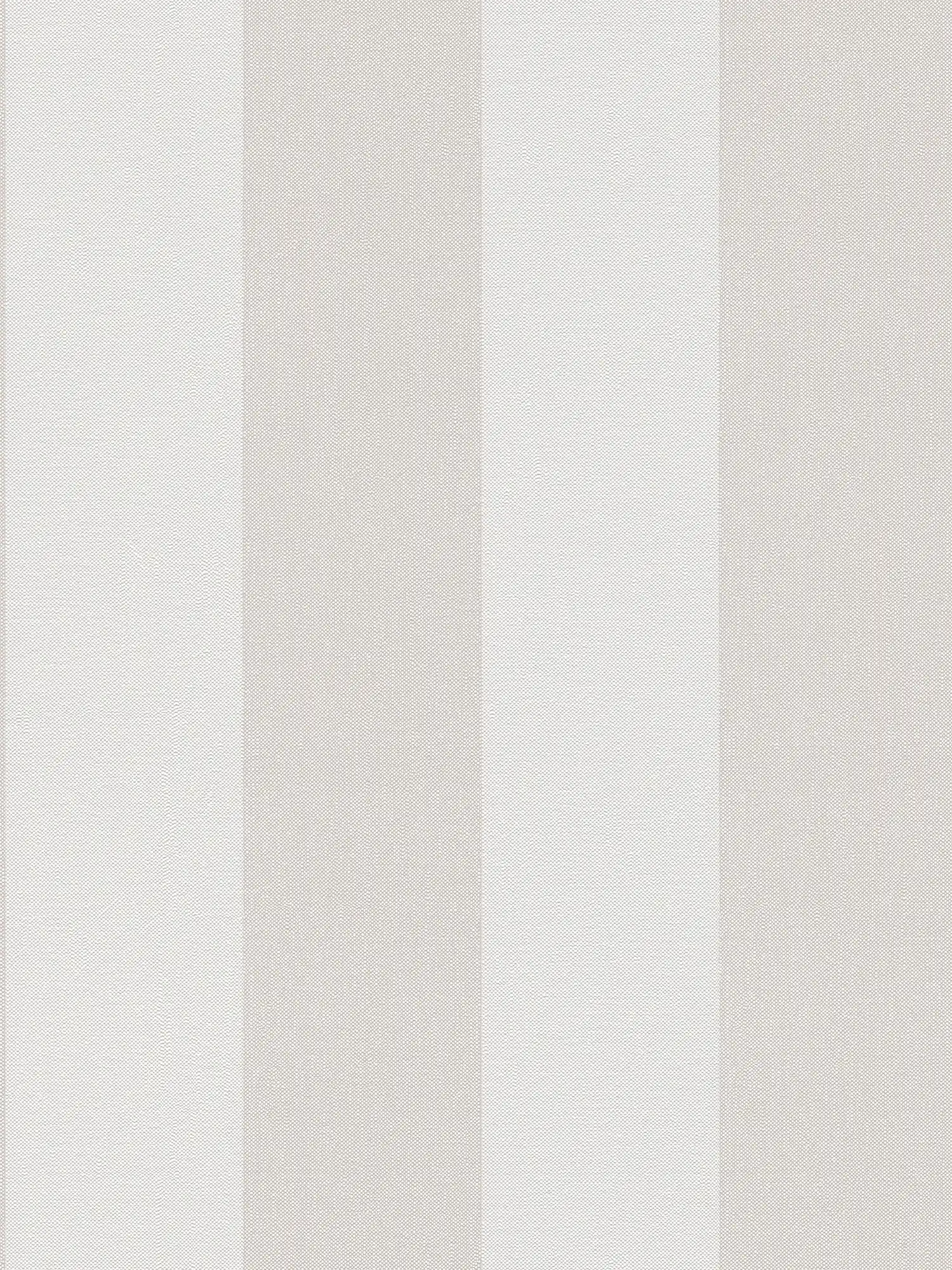 Textured non-woven wallpaper with wide stripes - cream, beige
