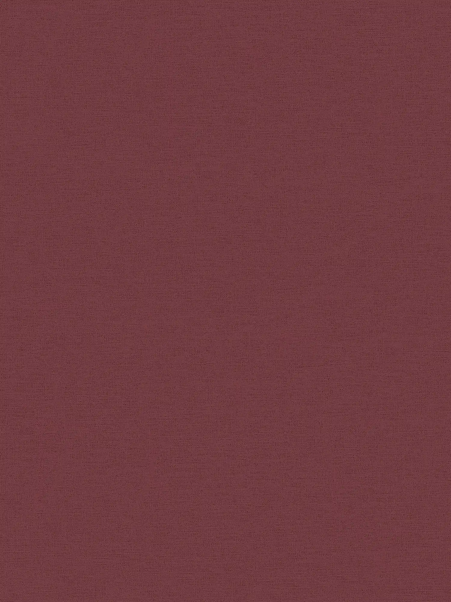         Einfarbige Tapete Bordeaux Rot mit Textiloptik
    