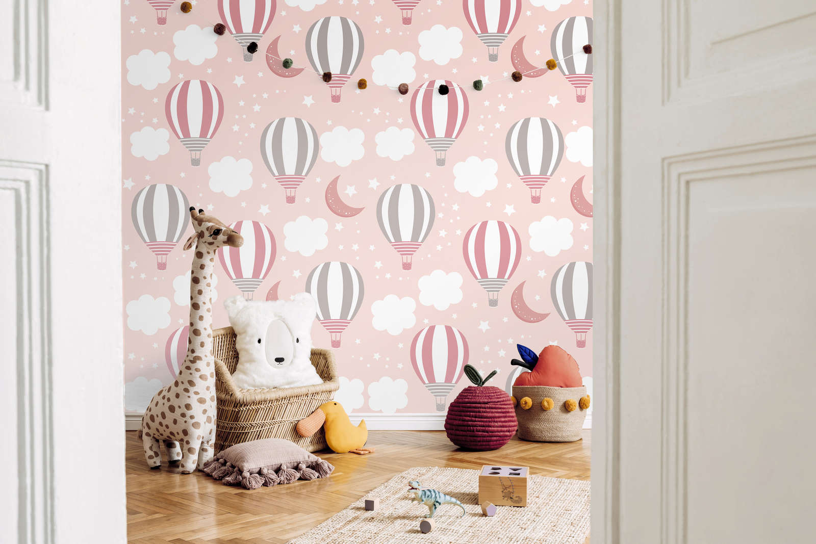             Romantic nursery wallpaper with hot air balloons and starry sky in delicate pastel shades - pink, grey, white
        