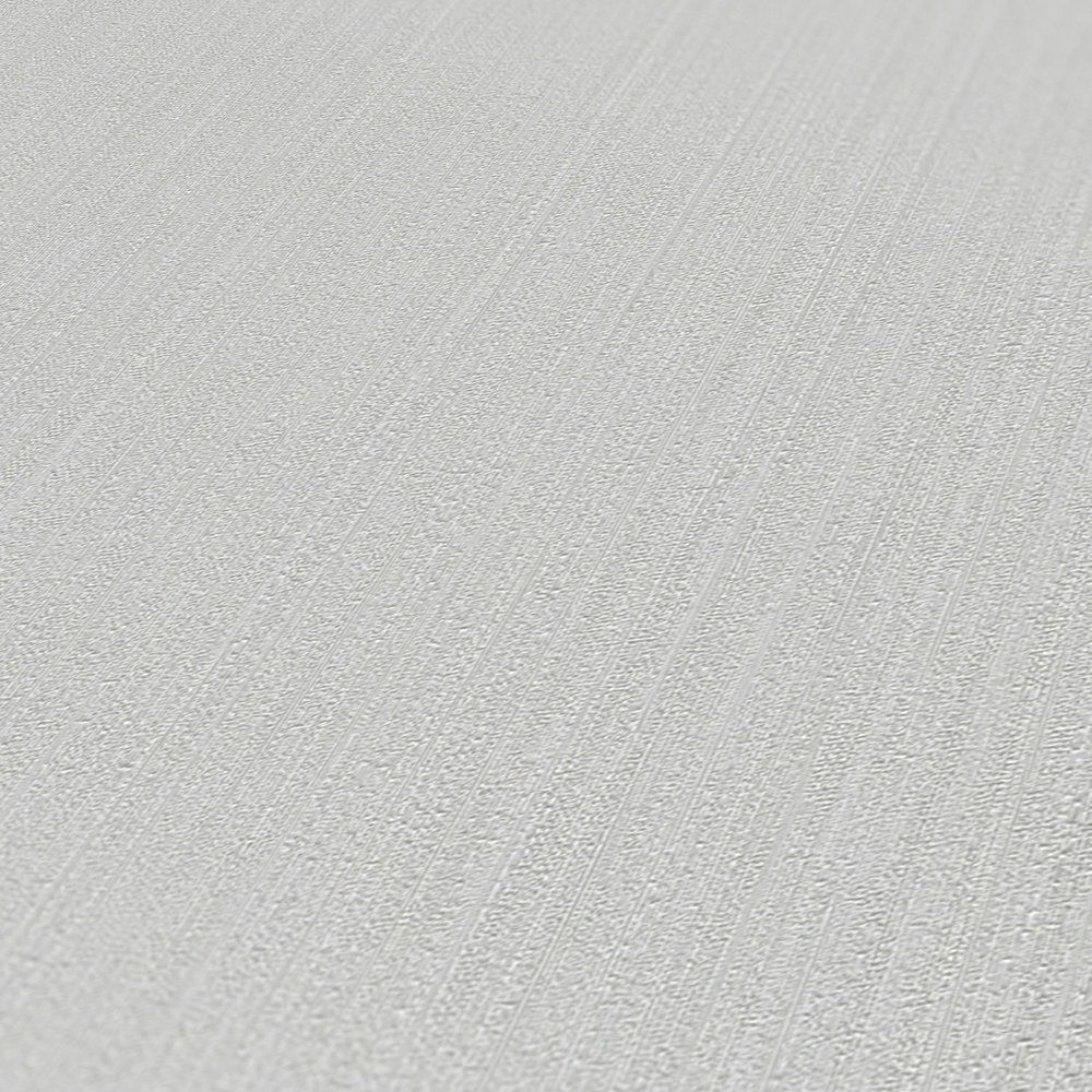             Hellgraue Vliestapete mit Strukurmuster, einfarbig & seidenmatt
        
