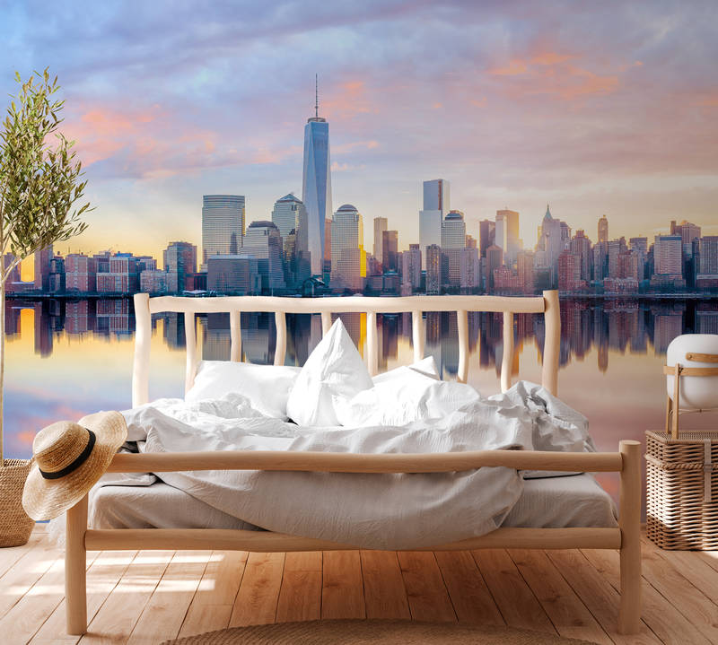             Photo wallpaper New York skyline in the morning - blue, grey, yellow
        