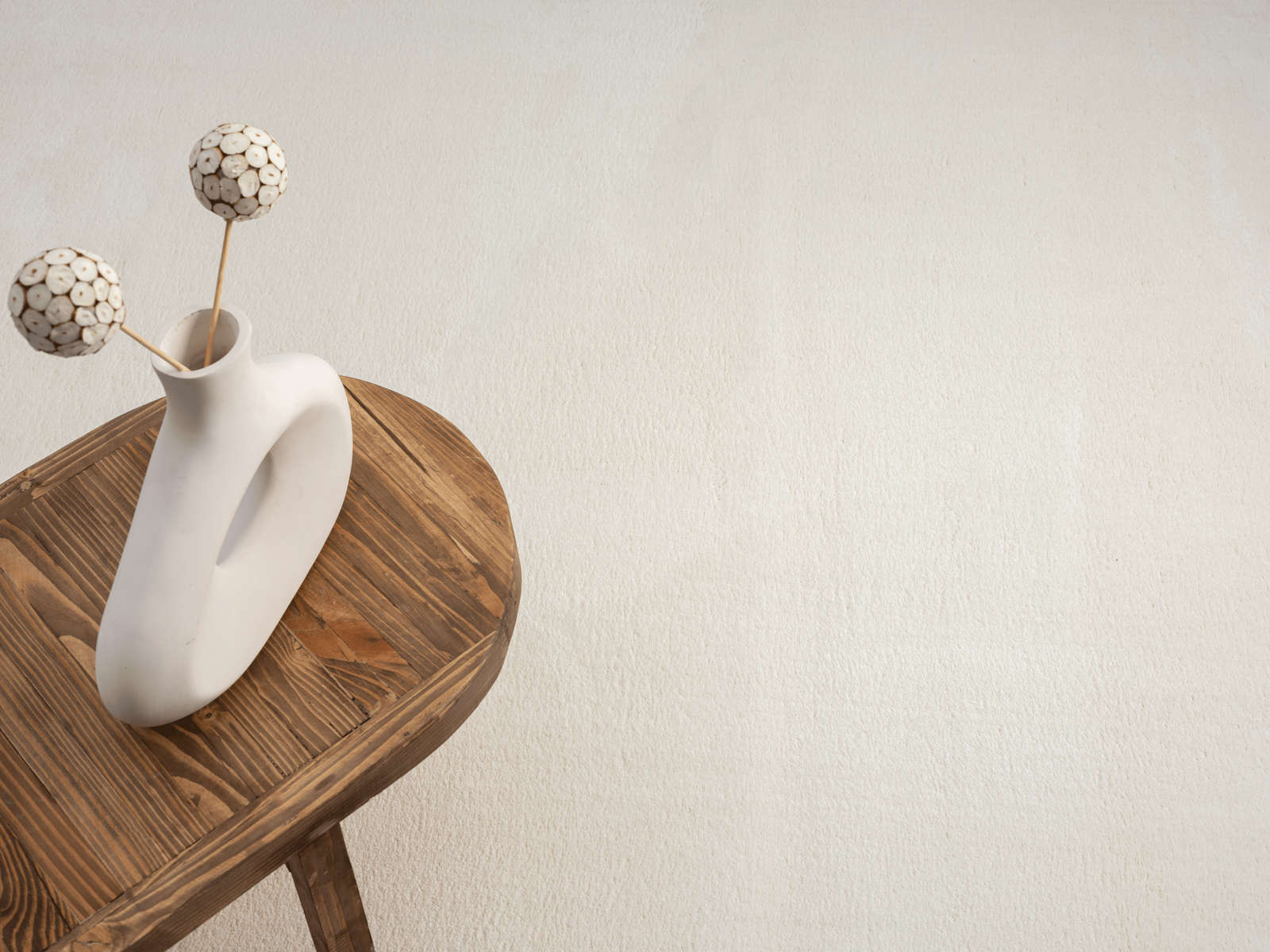             Modischer Hochflor Teppich in Creme – 110 x 60 cm
        