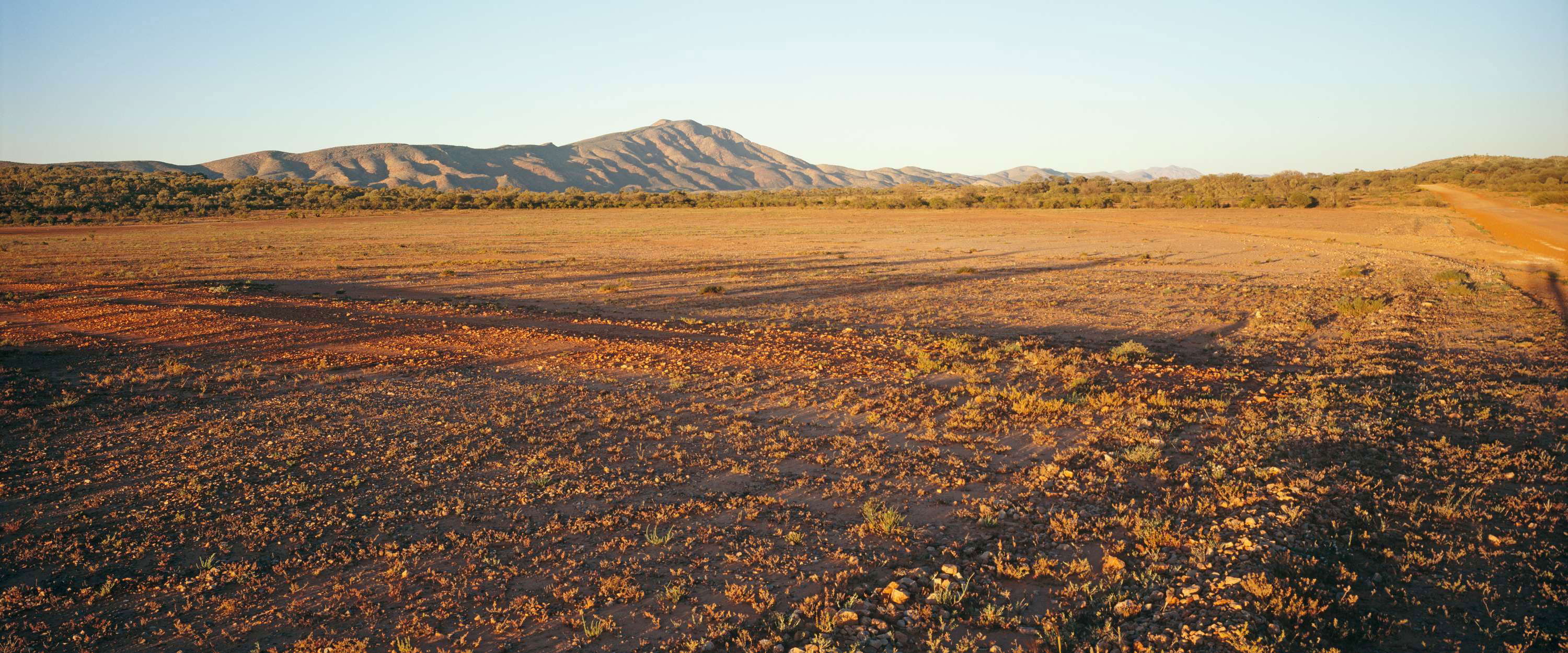             Fototapete Down Under Landschaft im Sonnenuntergang
        