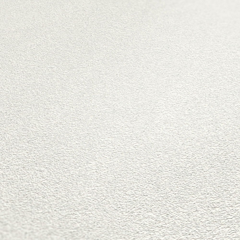             Unitapete mit Oberflächenstruktur & Glitzereffekt – Weiß
        