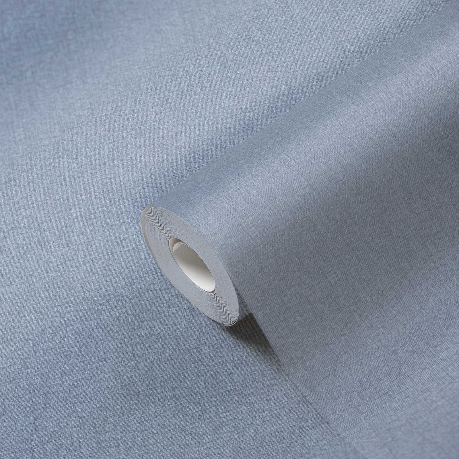             Einfarbige Vliestapete in Textil-Optik mit leichter Struktur, matt – Blau
        