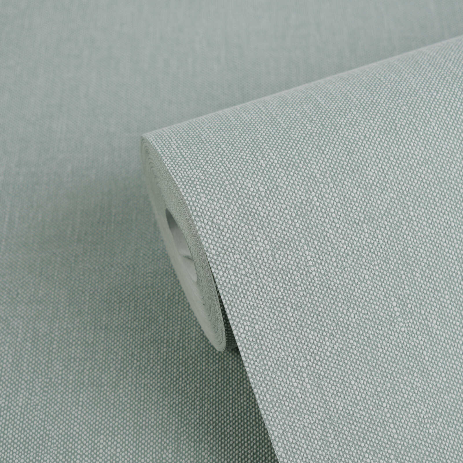 Einfarbige Vliestapete im Textillook – Grün