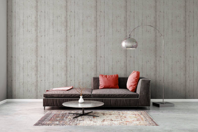             Fototapete mit Sichtbeton-Optik – offene Bretterschalung
        